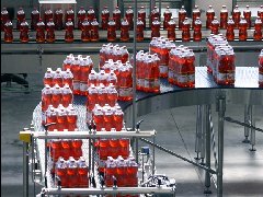 飲料熱收縮膜包機的工作原理